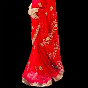 Luxurious Red and Gold Embellished Wedding saree
